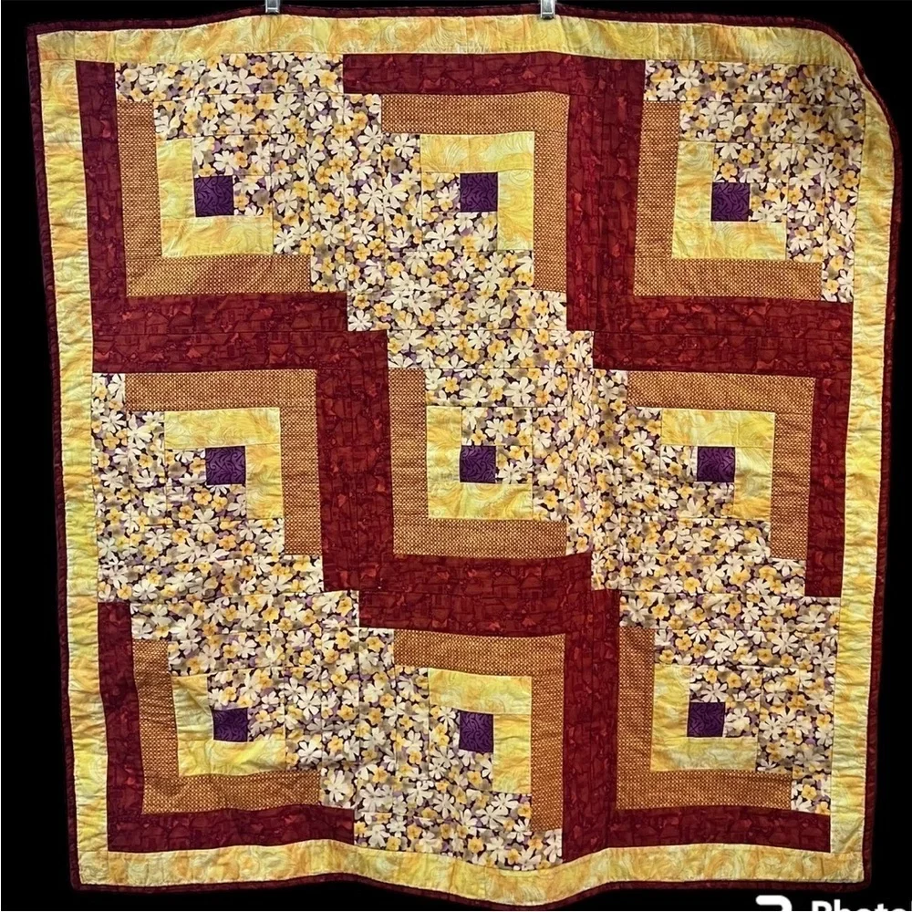 Hand crafted yellow square and floral quilt